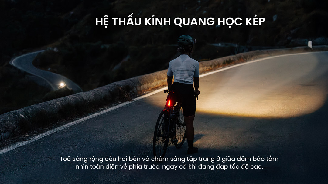 Đèn Magicshine HORI 1300 chiếu sáng toàn diện hai bên và phía trước trên cung đường đèo ban đêm.